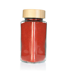 Red pepper powder in spice jar isolated on white