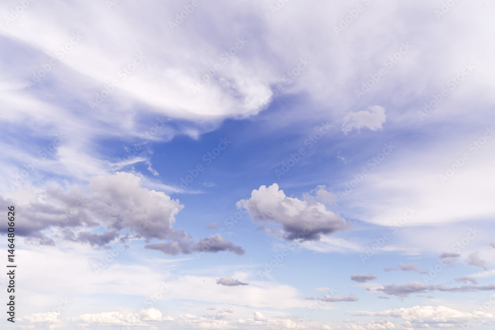 Wall mural beautiful soft gentle cloudy blue sky with white light cirrus clouds, abstract background texture