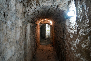 Obraz premium Underground tunnels of Stari grad Bar (Old Town of Bar), an ancient walled city overlooking the Adriatic Sea in Montenegro