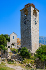 Clock tower and St Catherine&rsquo;s Church of Stari grad Bar (Old Town of Bar), the ruins of an ancient walled city at the foot of Mount Rumija in Montenegro