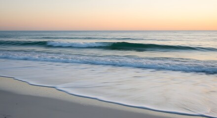 Obraz premium Sunrise beach calm waves