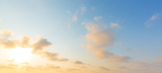 Golden sky and clouds,Beautiful , luxury soft gradient orange gold clouds and sunlight on the blue sky perfect for the background, take in everning,Twilight, Large size, high definition landscape phot