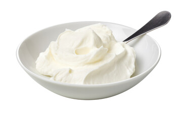 Whipped Cream in Bowl: A dollop of smooth, creamy whipped cream sits in a pristine white bowl, accompanied by a silver spoon.  The perfect ingredient for dessert, coffee, or a sweet treat. 