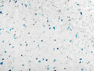 Bianco Sapphire Terrazzo surface, characterized by a predominantly white base speckled with...