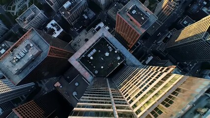 Aerial view of modern city skyscrapers. Rooftop patios and urban density