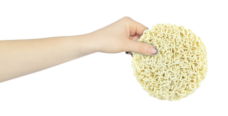 raw instant noodles, in hand, outstretched hand with noodle briquette isolated from background
