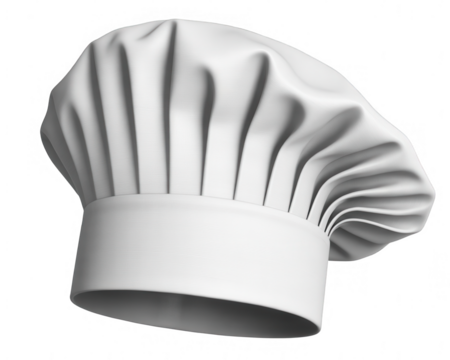 A white chef hat with pleats and a cylindrical base isolated on a black background in a studio shot