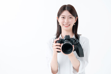 Fototapeta premium カメラを持つ女性