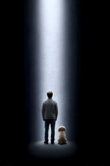 Fototapeta premium Person and dog standing in a beam of light