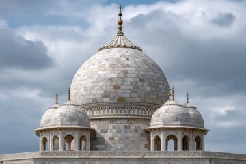 Fototapeta premium Taj Mahal Domes: Serene Marble Architecture under Cloudy Skies