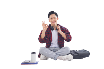 portrait of asian male student sitting posing on white background