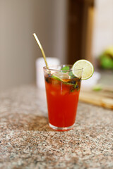 Vibrant Red and Yellow Mocktail Cocktails with Fresh Citrus and Cherry Garnish