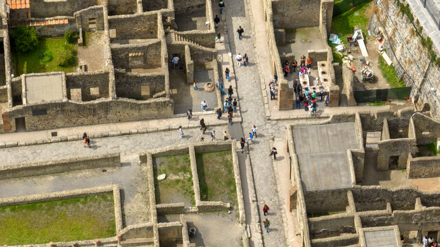 Aerial view of the street, ruins and excavations of Herculaneum. It is an archaeological area of ​​an ancient Roman city, near Pompeii, in the province of Naples, Italy. It is a tourist destination.