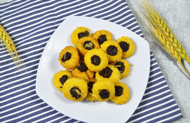 Nastar Cookies, Pineapple tarts or nanas tart are small, bite-size pastries filled or topped with...