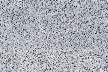 Close-up, texture, background of gray granite wall.