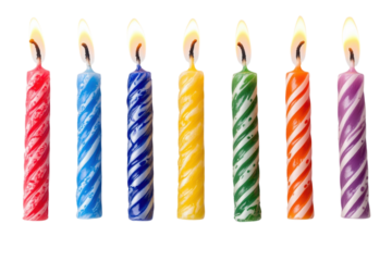 Seven brightly colored spiral birthday candles lit against a black background celebrating a on transparent background