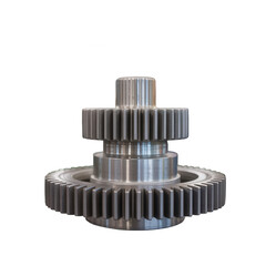 A close up of a silver metal gear assembly with multiple gears stacked on top of each other on black