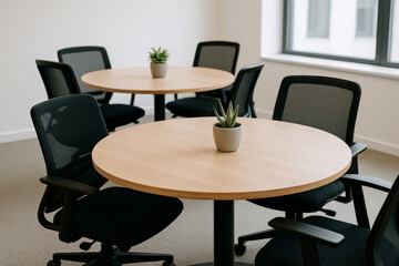 Round tables in modern coworking space – minimal close-up office interior
