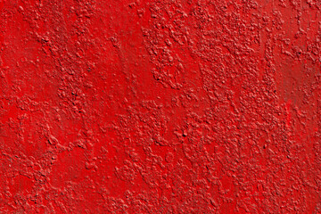 Close up background rough texture of abstract surface painted red.