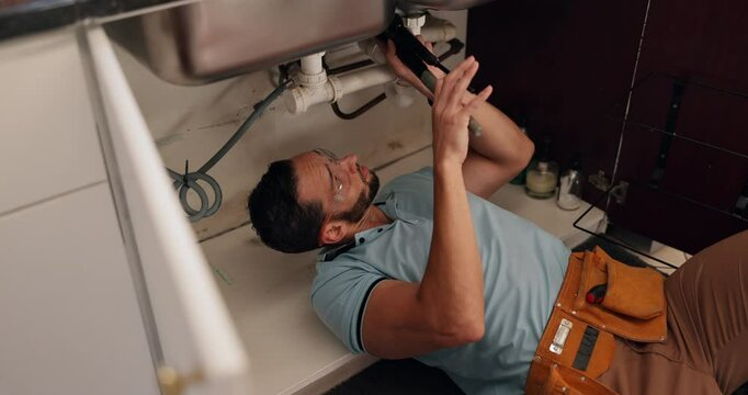 Plumbing, process and series of man and woman in home kitchen for maintenance or repair. Fixing, service or small business with customer and plumber in apartment for emergency inspection of pipes