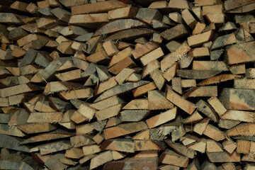 Firewood stacked in a firewood stove view from the end