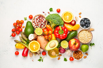 Healthy food assortment on white background.