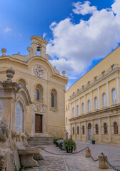 Glimpse of historic center of Gravina in Puglia, Apulia region in southern Italy: view of Notar Domenico  Square with the Four Fountains and the Library Finia.