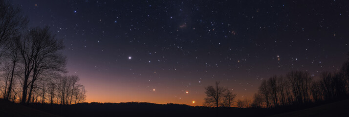 A twilight landscape with bare trees silhouetted against a glowing horizon, under a sky filled with countless stars, blending the beauty of night and the last light of sunset