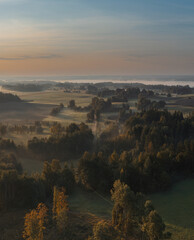 Obraz premium Sunset at Lake Sivers on a summer morning in the Latvian countryside in Latgale.