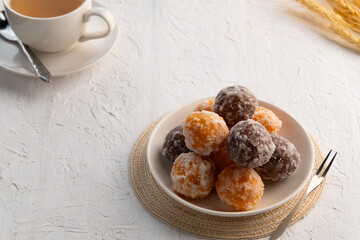 Kanom Kai Hong, a kind of Thai dessert made from rice flour Stuffed with Mung Bean and coated with sugar.Thai snack food (Swan Eggs Dessert)