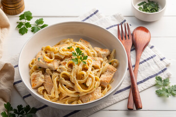 alfredo chicken pasta,Alfredo sauce with cooked fettuccine pasta in creamy sauce and juicy chicken...