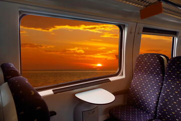 Empty interior of the train for long and short distance in Europe train carriage with blue seats.             