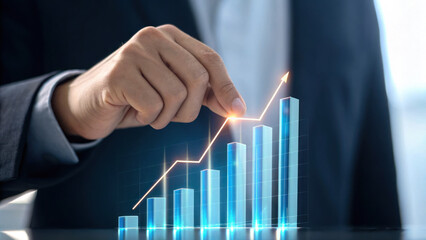 Person suit is pointing rising graph, symbolizing growth and success business. image conveys sense of achievement and progress