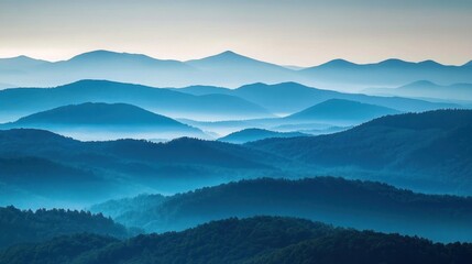 Fototapeta premium Misty mountain range at dawn
