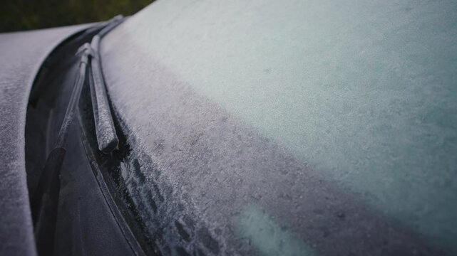 Frost on a completely covered car windscreen
