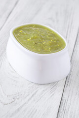 White bowl of salsa verde with zesty vibrant green and clean finish