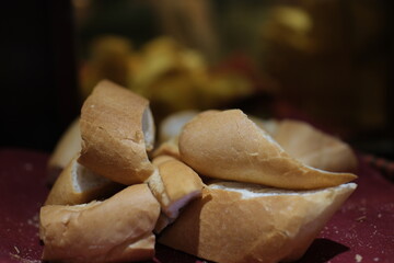 one loaf of wheat flour on the table, using white bread for cooking close up. High quality photo