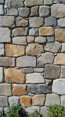 Fototapeta premium Grey granite plain stone texture with natural speckled pattern in a vertical format. Symbolizes strength, durability, and simplicity—ideal for backgrounds, surfaces, or architectural mockups.