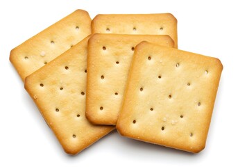 Fototapeta premium A close up shot of five square crackers arranged on a white background in a studio setting