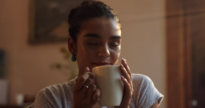 Happy, drink and woman with coffee in home for caffeine break, resting and warm beverage. Morning, house and person with latte, tea and espresso for calm, peace and satisfaction in living room