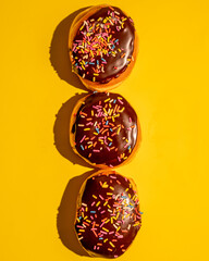 Three Boston cream donuts
