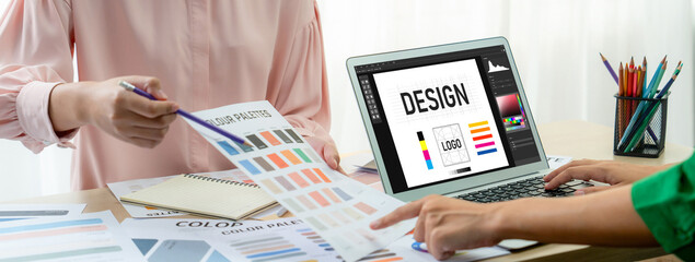 Graphic designer software for modern design of web page and commercial brisk ads showing on the...