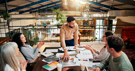 Creative paperwork, people and applause in meeting for campaign performance, KPI goals and branding success. Design agency, employees and clapping hands for marketing pitch approval and achievement