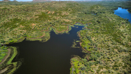 Australian remote bushland with it´s vegetation and a lake, seen from above
