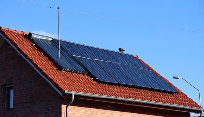 Residential Solar Panel Installation on Brick Roof with Gutter