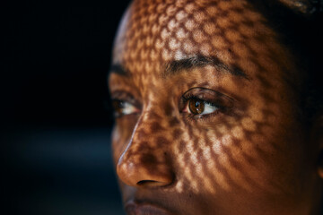 Close-up of sunlight shining on woman's face