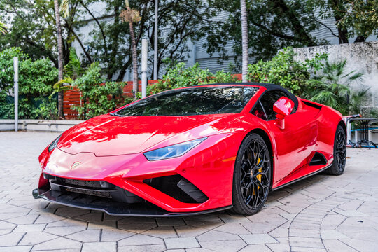Miami, Florida, USA - November 18, 2024: Lamborghini Huracan EVO RWD Spyder sportscar supercar. Sport car of Lamborghini Huracan EVO. Red car of Lamborghini Huracan EVO outdoor, corner view