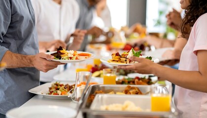 Diverse group of people enjoying a delicious buffet breakfast with fresh fruit and pastries