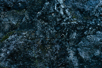 Rough Dark Stone Texture with Moss for Natural Backgrounds and Designs