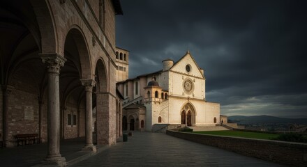 Fototapeta premium Majestic Basilica di San Francesco d'Assisi Under Dramatic Skies Captivating Architectural Grandeur and Spiritual Ambiance